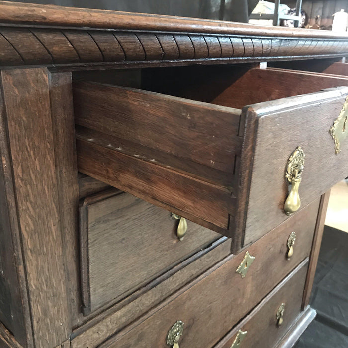 Antique oak chest of drawers with brass pulls