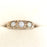 Vintage gold engagement ring with opals and diamonds