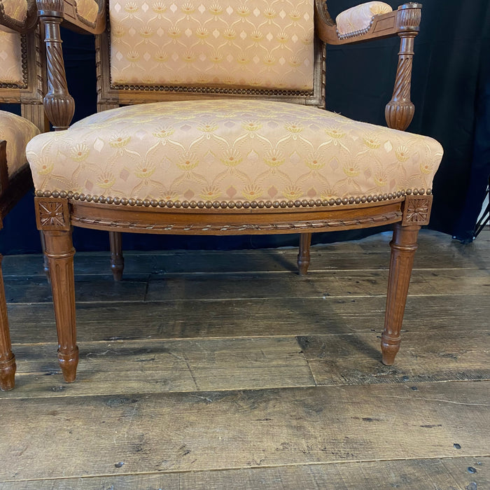 Pair of French Louis XVI Hand Carved Walnut Armchairs or Fauteuils Late 19th/Early 20th Century