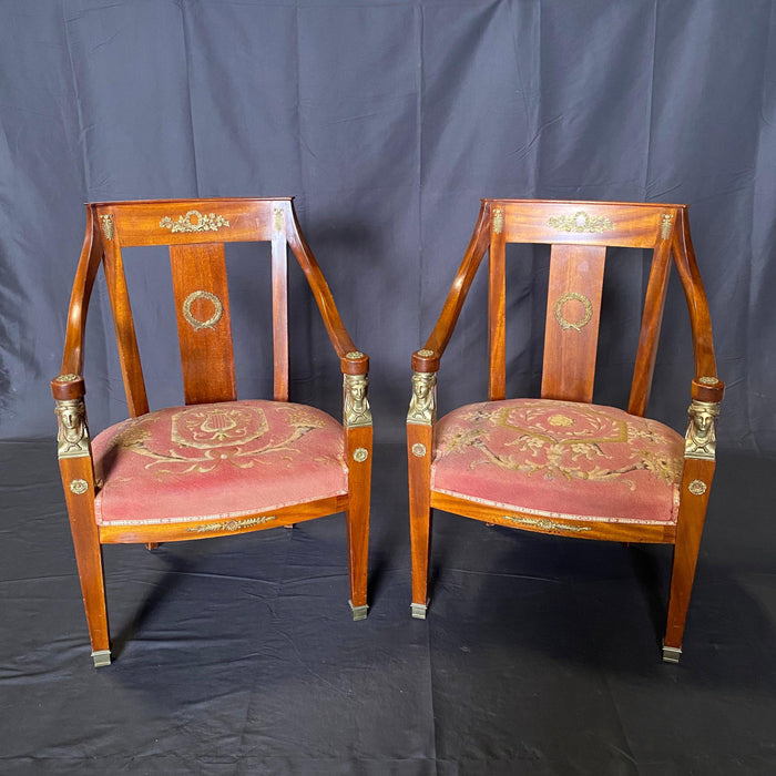 Pair of Elegant French Neoclassical Armchairs with Bronze Figural Arms