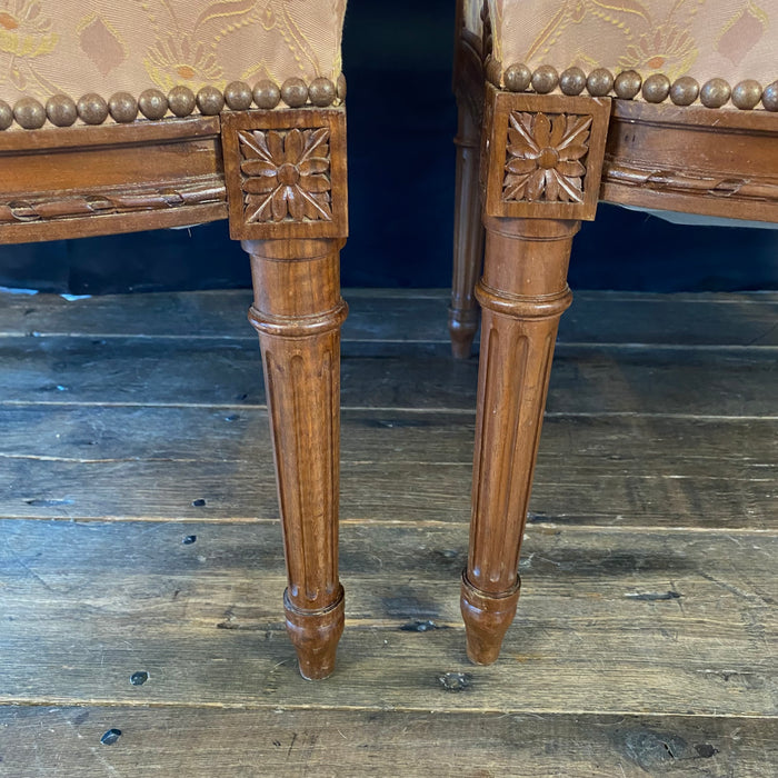 Pair of French Louis XVI Hand Carved Walnut Armchairs or Fauteuils Late 19th/Early 20th Century