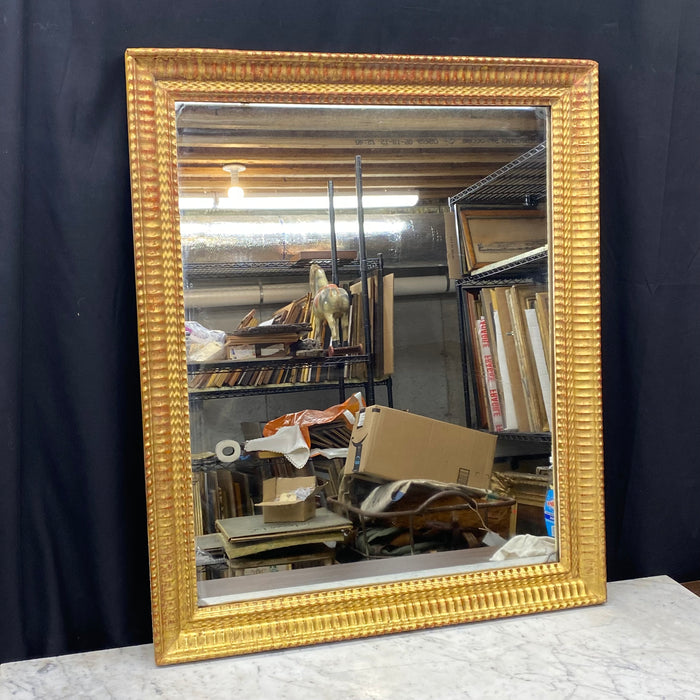 18th Century French Carved Giltwood Wall Mirror with Original Gold Leaf Paint