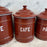 Set of Five French Reddish Brown Enamel Kitchen Canisters with Original Lids
