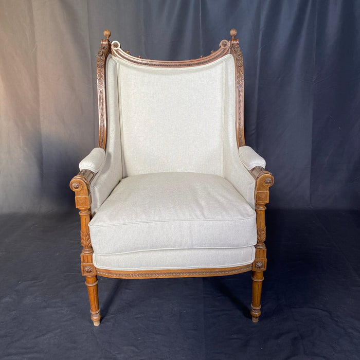 French 19th Century Louis XVI Exquisitely Carved Elegant Walnut Bergere, Armchair or Wing Chair with New Upholstery