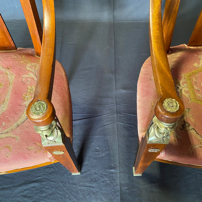 Pair of Elegant French Neoclassical Armchairs with Bronze Figural Arms