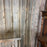 Antique Maine Wooden Porch Swing with Slatted Seat and Decorative Cutout Back