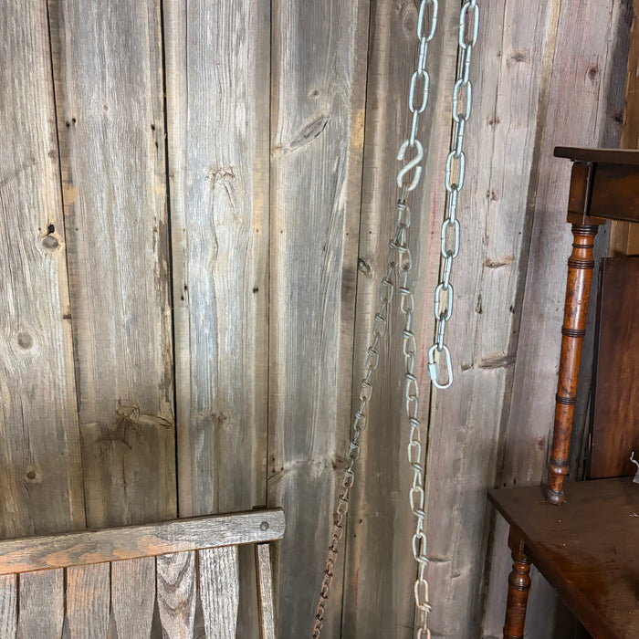 Antique Maine Wooden Porch Swing with Slatted Seat and Decorative Cutout Back
