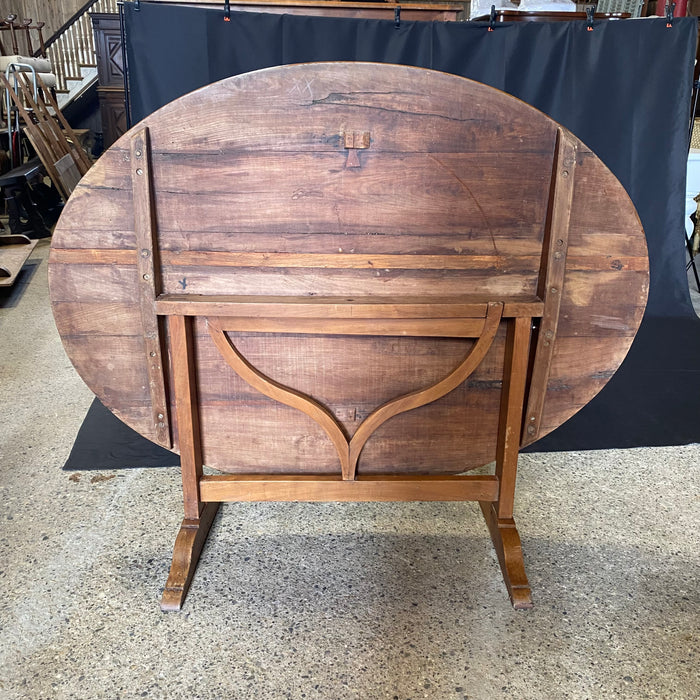 Large Oval French Early 19th Century Vigneron or Tilt-Top Walnut 'Table De Vendange' or Wine Tasting Table with Lovely Cherry Patina