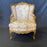 Pair of French Louis XV Giltwood Bergere Armchairs or Wingback Chairs with Carved Floral Motifs