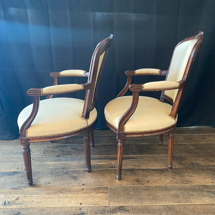 French Pair Louis XVI Carved Mahogany Fauteuil Arm Chairs