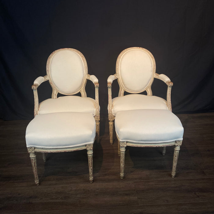 French Pair Louis XVI Armchairs or Fauteuils with Matching Footstools or Ottomans