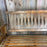 Antique Maine Wooden Porch Swing with Slatted Seat and Decorative Cutout Back