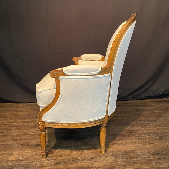 Pair of French Louis XVI Carved Walnut Armchairs or Bergere Chairs