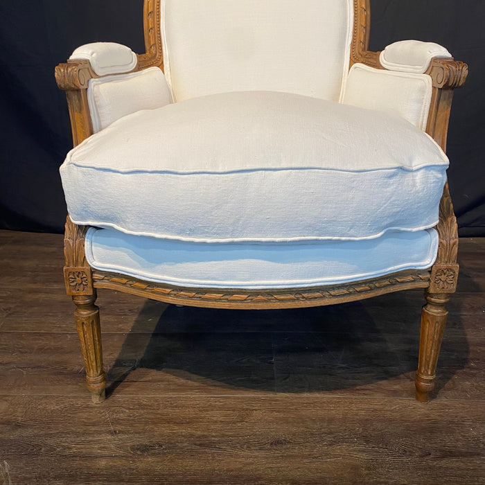 Pair of French Louis XVI Carved Walnut Armchairs or Bergere Chairs