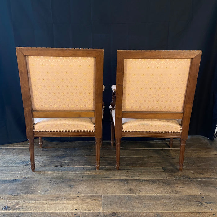 Pair of French Louis XVI Hand Carved Walnut Armchairs or Fauteuils Late 19th/Early 20th Century
