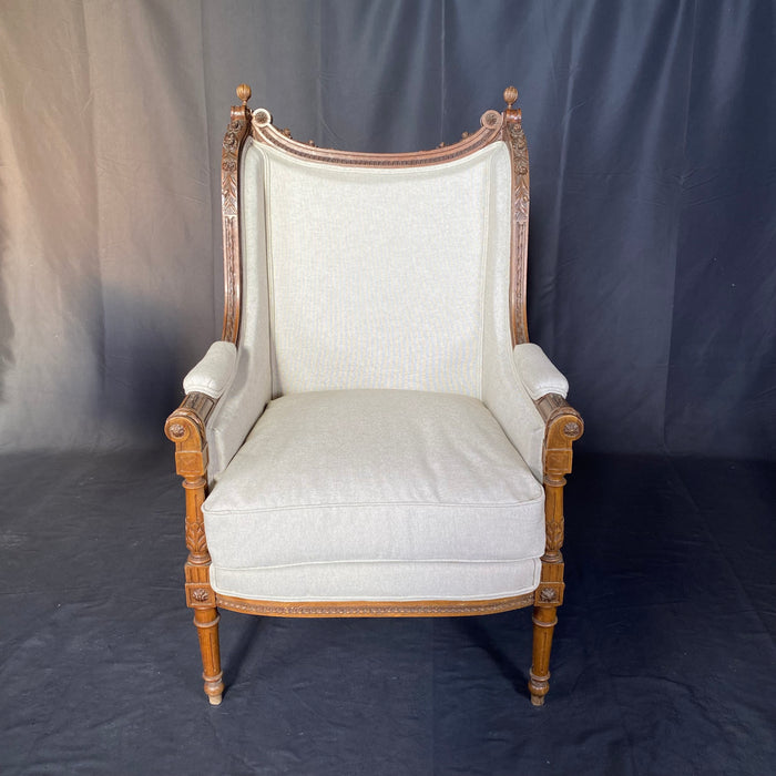 French 19th Century Louis XVI Exquisitely Carved Elegant Walnut Bergere, Armchair or Wing Chair with New Upholstery