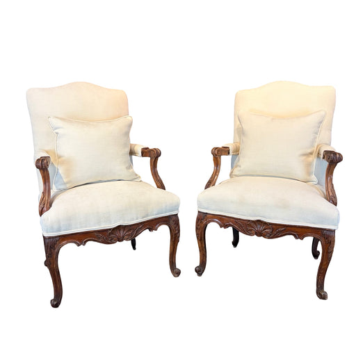 Pair of Early 19th Century French Louis XV Carved Walnut Fauteuil Armchairs with New Neutral Upholstery