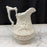 English Ridgway Eglinton Tournament Relief-Molded Stoneware Jug or Pitcher, circa 1840