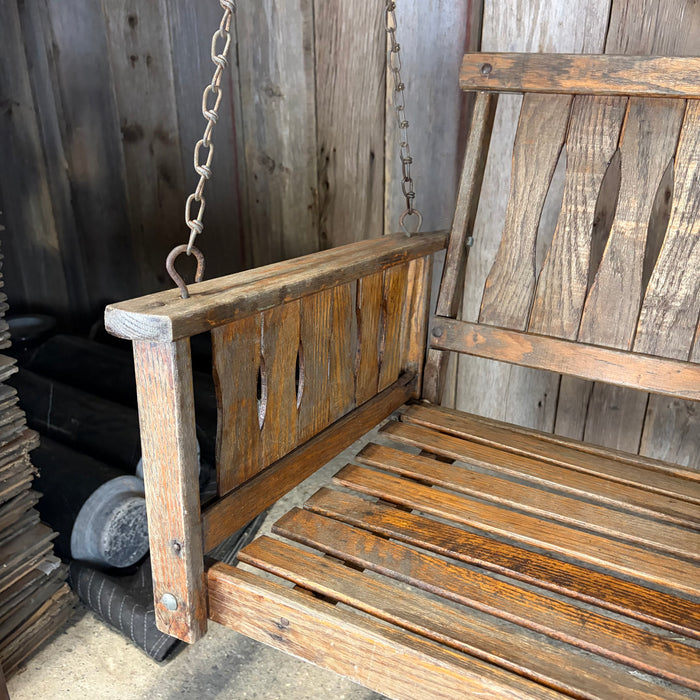 Antique Maine Wooden Porch Swing with Slatted Seat and Decorative Cutout Back