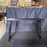 Pair of Ebony Spanish Console Table with Turned End Supports Joined by Iron Stretchers