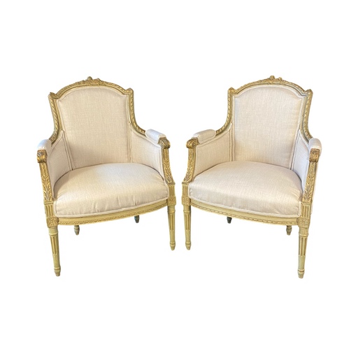 Pair of Intricately Carved French 19th Century Painted Louis XVI Bergere Armchairs with New Neutral Upholstery