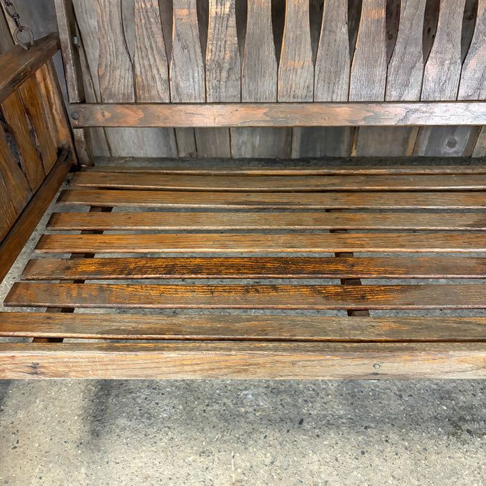 Antique Maine Wooden Porch Swing with Slatted Seat and Decorative Cutout Back