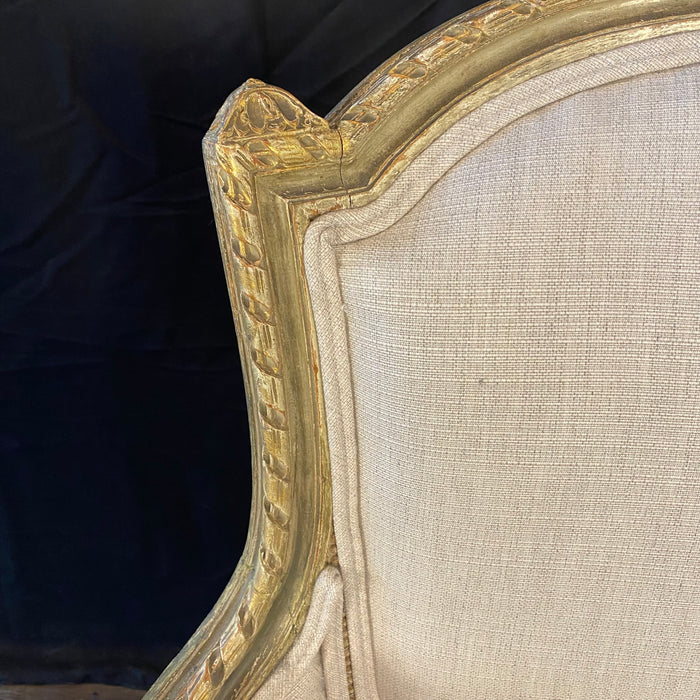 Pair of Intricately Carved French 19th Century Painted Louis XVI Bergere Armchairs with New Neutral Upholstery