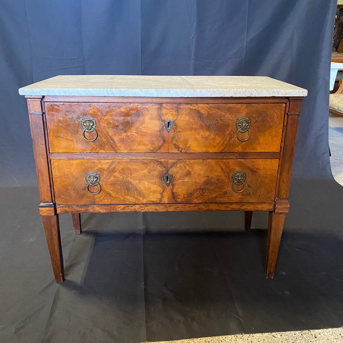 Early 19th Century French Continental Neoclassical Fruitwood Directoire Commode with Lion Pulls and Original Marble Top