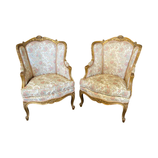 Pair of French Louis XV Giltwood Bergere Armchairs or Wingback Chairs with Carved Floral Motifs