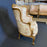 Pair of French Louis XV Giltwood Bergere Armchairs or Wingback Chairs with Carved Floral Motifs