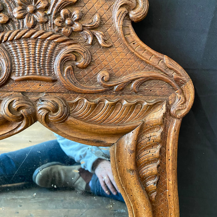 19th Century French Carved Provincial Wooden Walnut Mirror with Floral and Wave Motif