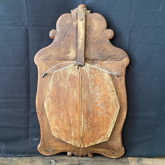 19th Century French Carved Provincial Wooden Walnut Mirror with Floral and Wave Motif