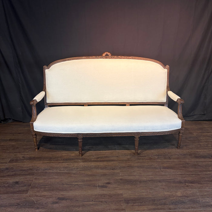 19th Century French Louis XVI Walnut Sofa or Canapé with Museum Quality Carving