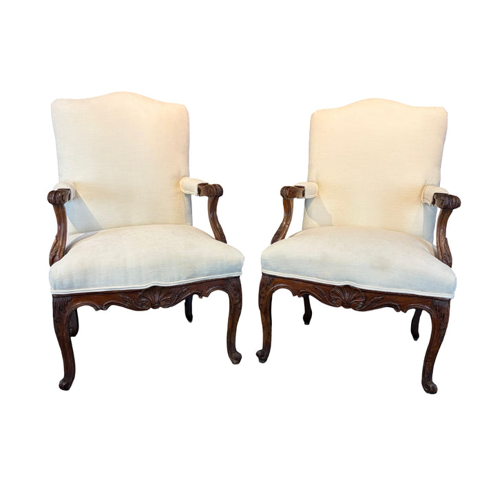 Pair of Early 19th Century French Louis XV Carved Walnut Fauteuil Armchairs with New Neutral Upholstery