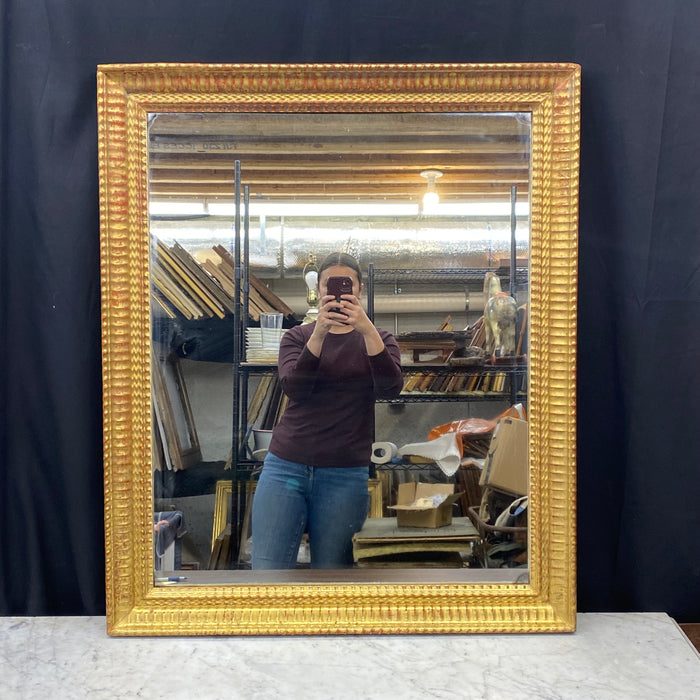 18th Century French Carved Giltwood Wall Mirror with Original Gold Leaf Paint