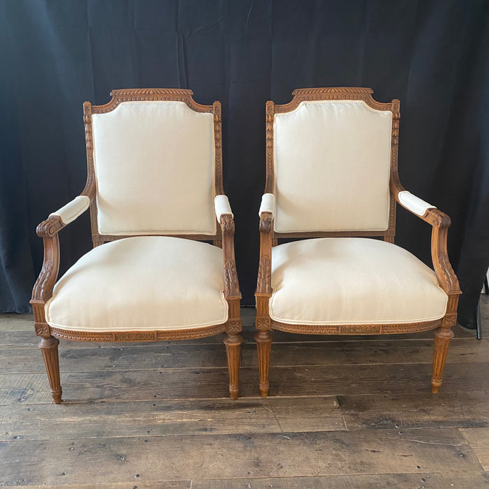 Pair of Antique French 19th Century French Neoclassical Louis XVI Carved Walnut Armchairs or Fauteuils