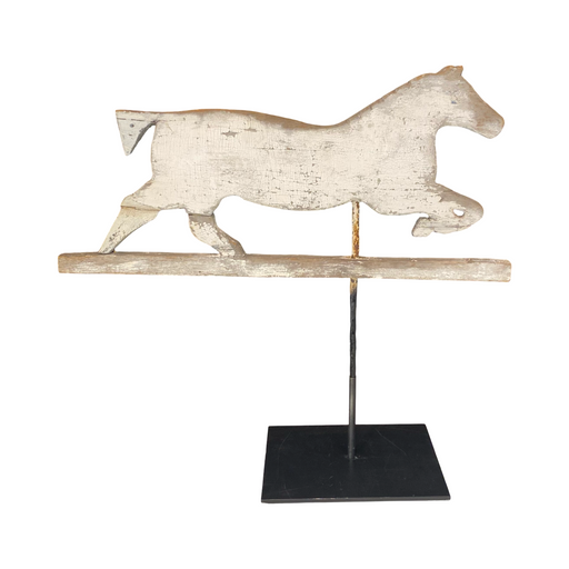 Decorative horse weathervane on a metal stand