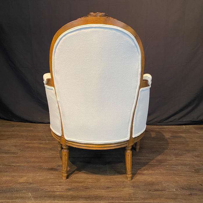 Pair of French Louis XVI Carved Walnut Armchairs or Bergere Chairs