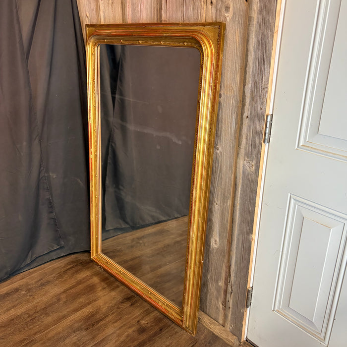 Exquisite 19th Century French Louis Philippe Large Giltwood Mirror with Rich Original Gold Leaf Gilding, Elegant Molded Frame and Beaded Detail