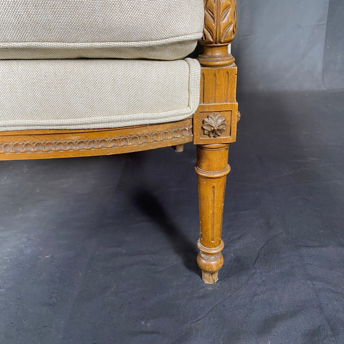 French 19th Century Louis XVI Exquisitely Carved Elegant Walnut Bergere, Armchair or Wing Chair with New Upholstery