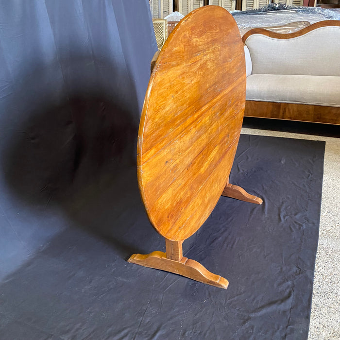 Large Oval French Early 19th Century Vigneron or Tilt-Top Walnut 'Table De Vendange' or Wine Tasting Table with Lovely Cherry Patina