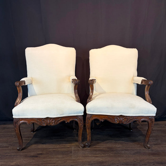 Pair of Early 19th Century French Louis XV Carved Walnut Fauteuil Armchairs with New Neutral Upholstery