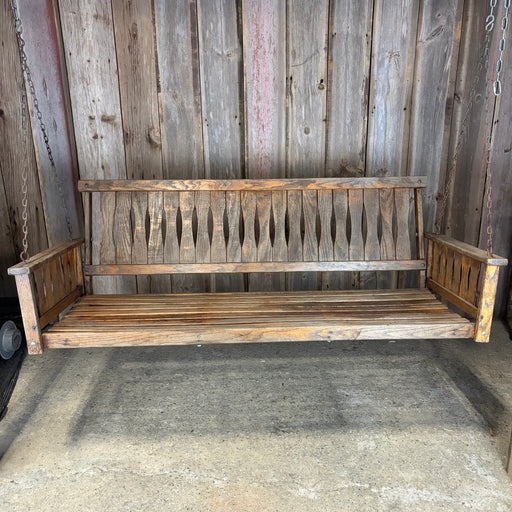 Antique Maine Wooden Porch Swing with Slatted Seat and Decorative Cutout Back