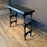Antique Ebony Spanish Console Table with Curved Wrought Iron Stretchers