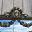 Tall Antique French Painted Neoclassical Pier Mirror with Gilt Accents, Floral Garlands, Ribbon Bow and Wreath Crest