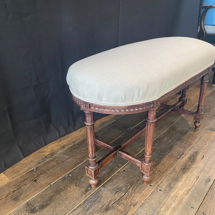 19th Century French Louis XVI Carved Walnut Oval Bench or Ottoman with New Upholstery