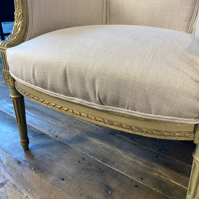 Pair of Intricately Carved French 19th Century Painted Louis XVI Bergere Armchairs with New Neutral Upholstery