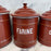 Set of Five French Reddish Brown Enamel Kitchen Canisters with Original Lids