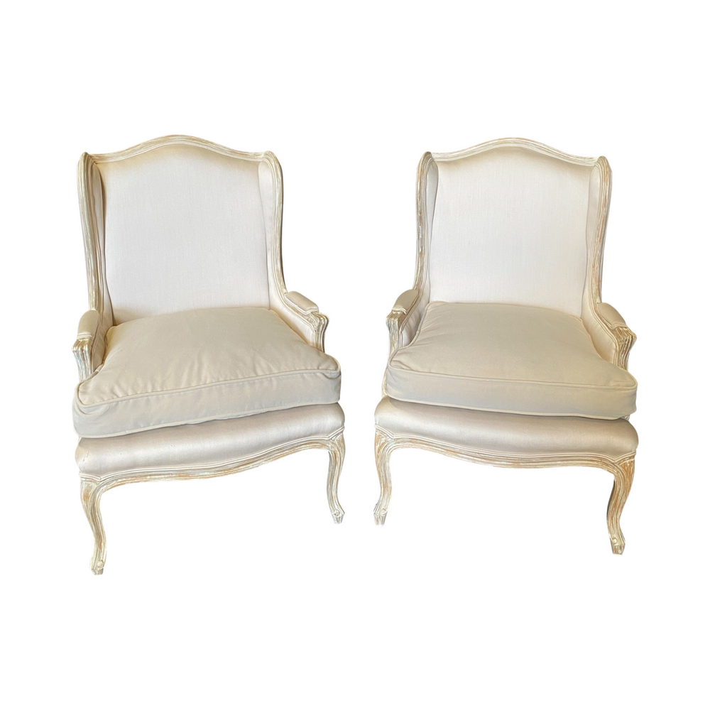 Pair of French Louis XV Style White Bergere Wing Chairs, Lounge Chairs or Arm Chairs in Patinated Wood