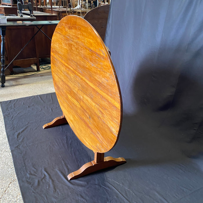 Large Oval French Early 19th Century Vigneron or Tilt-Top Walnut 'Table De Vendange' or Wine Tasting Table with Lovely Cherry Patina